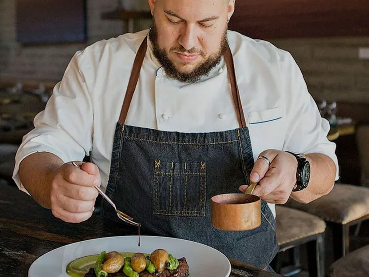 Chef Amar Santana preparing a dish